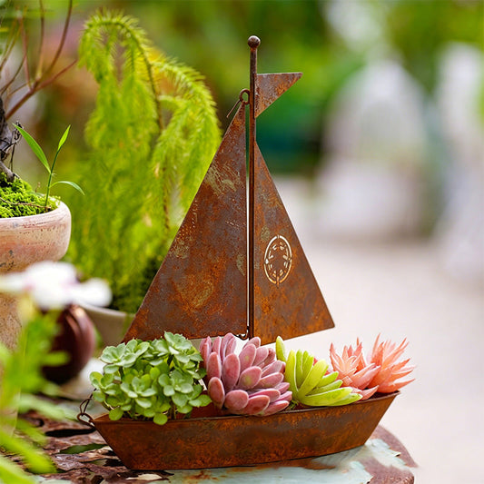 New Spring Collection – Limited Time Offer: Rustic Sailboat Metal Planter